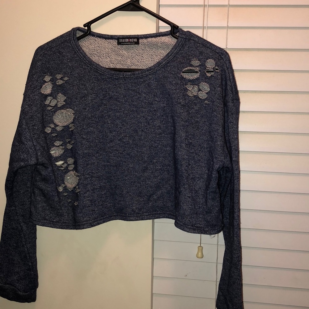 Cropped light sweater